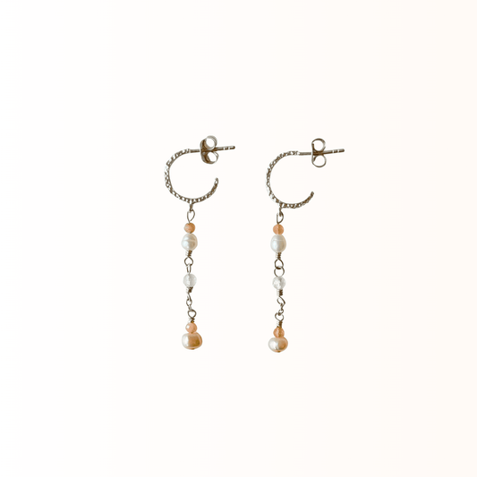 Dagmar øreringe - Feminin varme - Opal Smykker