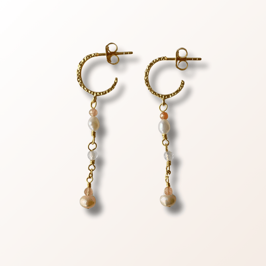 Dagmar øreringe guld - Feminin varme - Opal Smykker