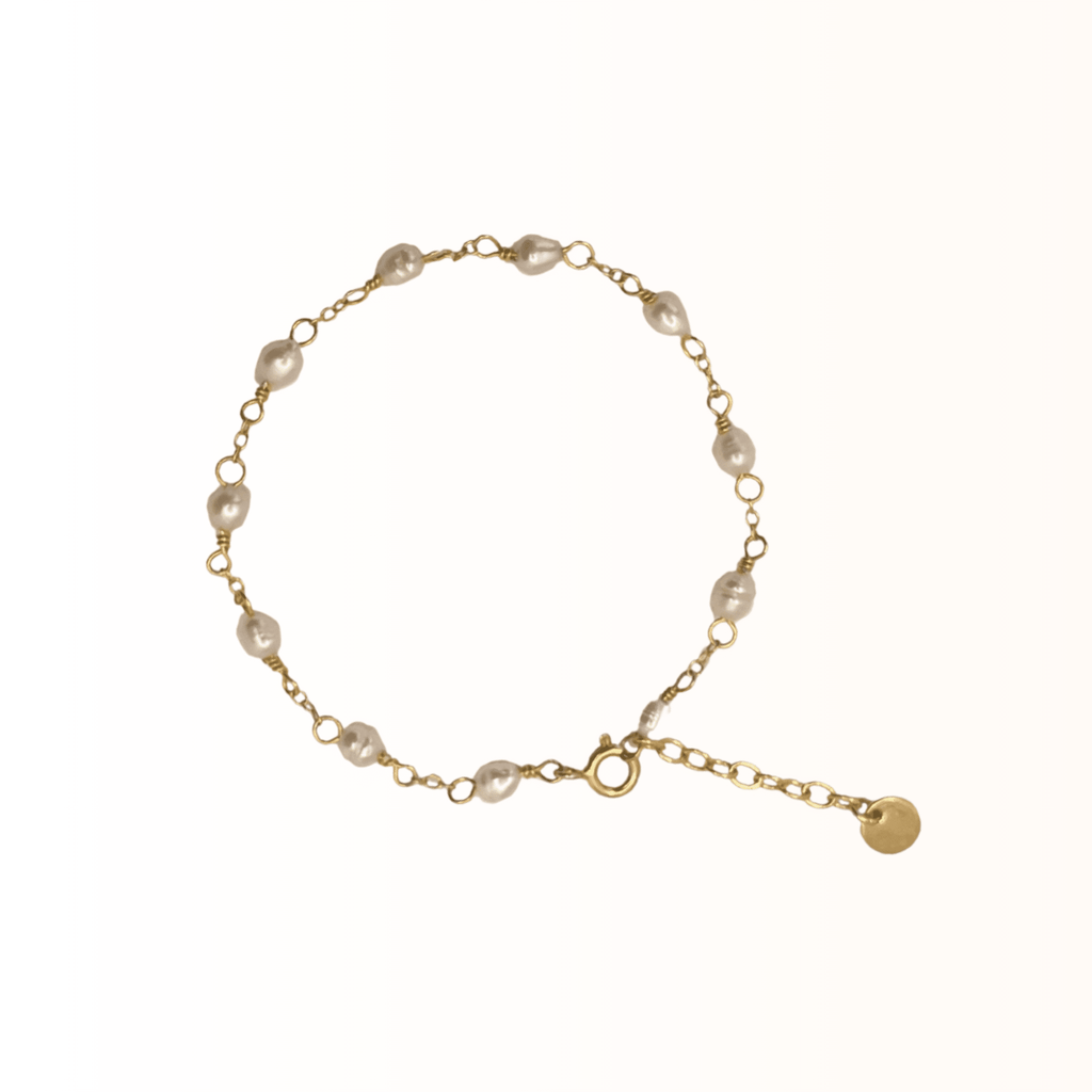 Daphnie armbånd guld - Elegant enkelthed - Opal Smykker